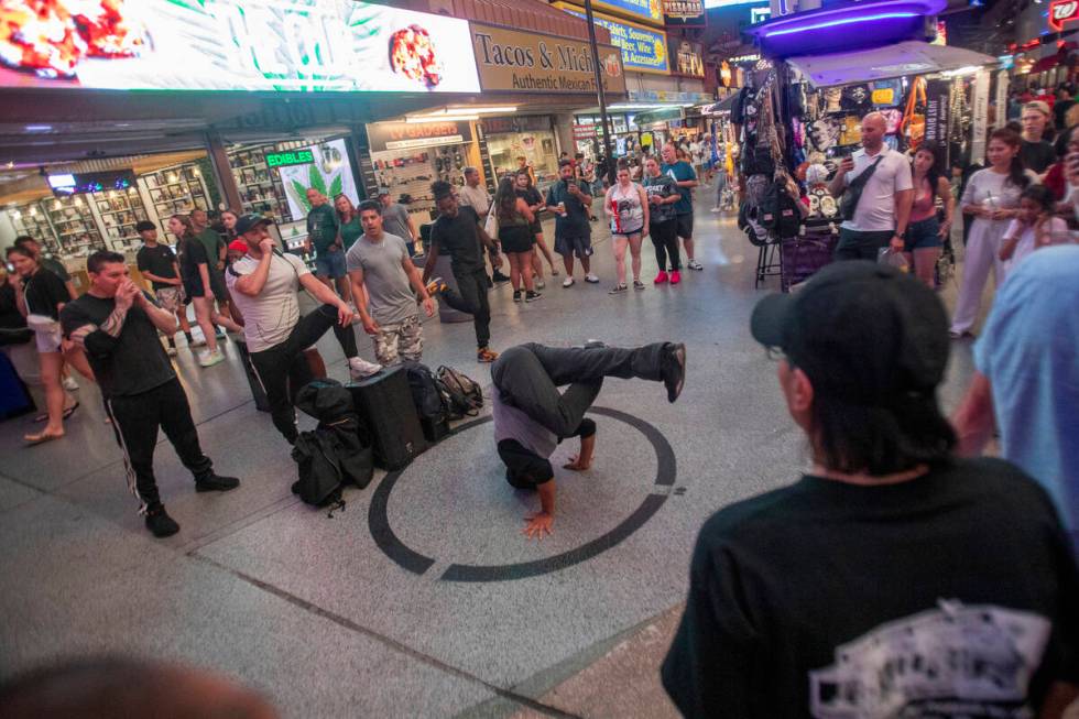 A group of buskers perform at the Fremont Street Experience Monday, July 1, 2024, in Las Vegas. ...