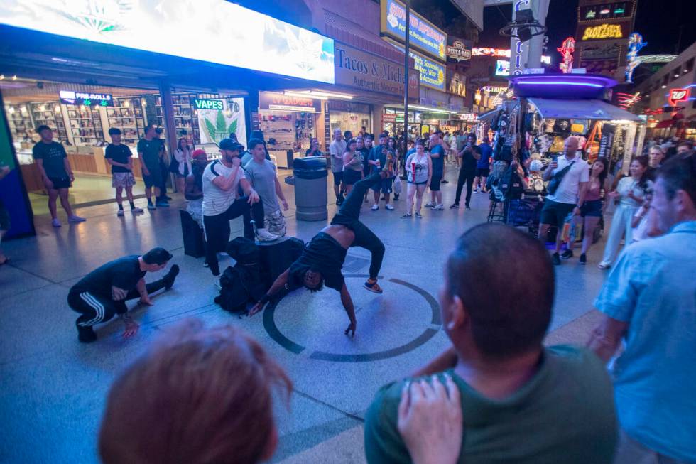 A group of buskers perform at the Fremont Street Experience Monday, July 1, 2024, in Las Vegas. ...