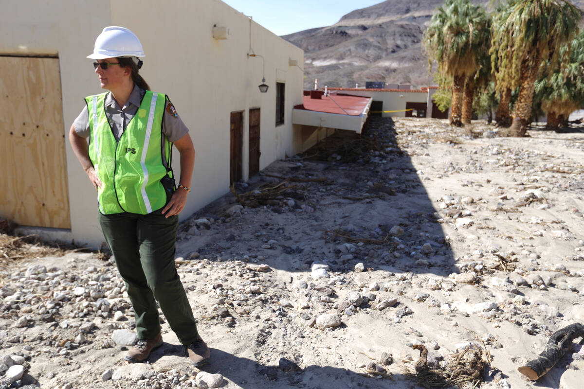 Abby Wines gives journalists a tour to view the flooding damage done to Scotty's Castle in Deat ...