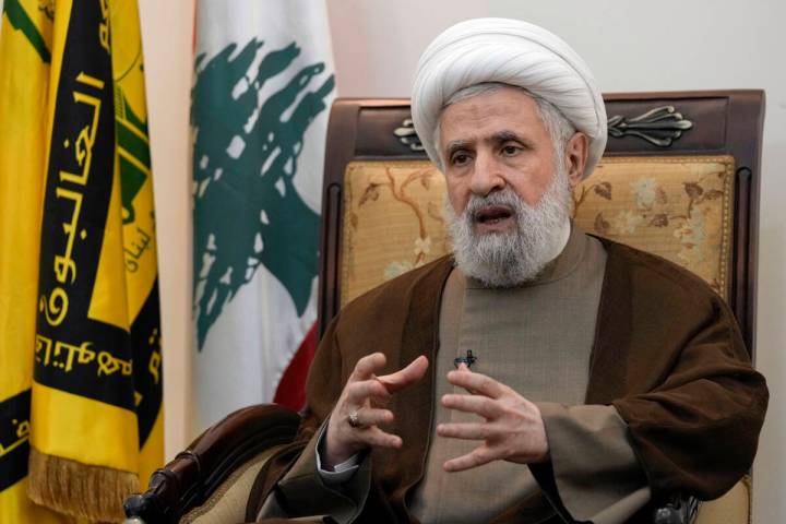 Hezbollah's deputy leader Sheik Naim Kassem, speaks during an interview with The Associated Pre ...