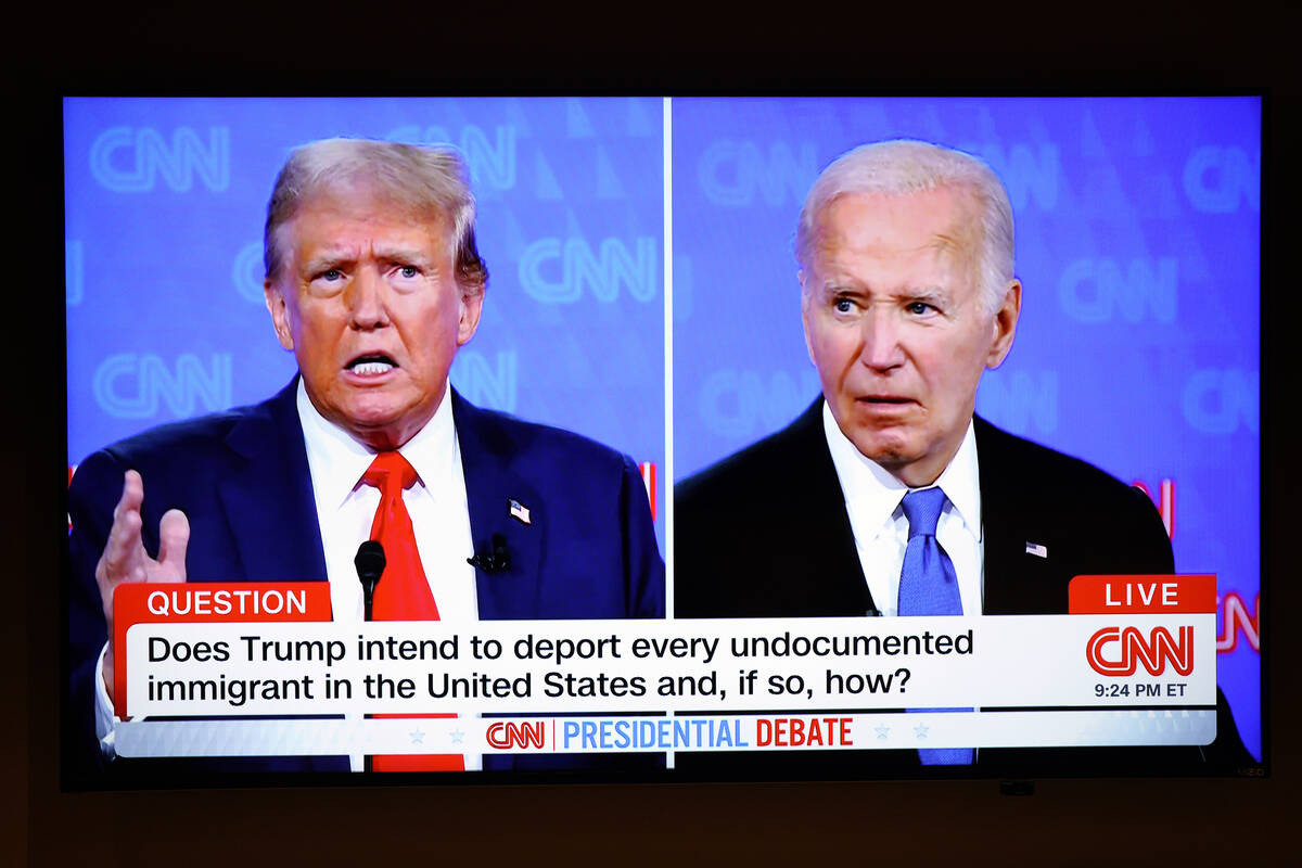The first 2024 presidential debate is seen on TV between President Joe Biden and Republican pre ...