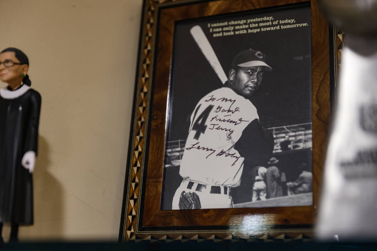 A signed photo of Larry Doby, an accomplished baseball player who broke the color barrier eight ...