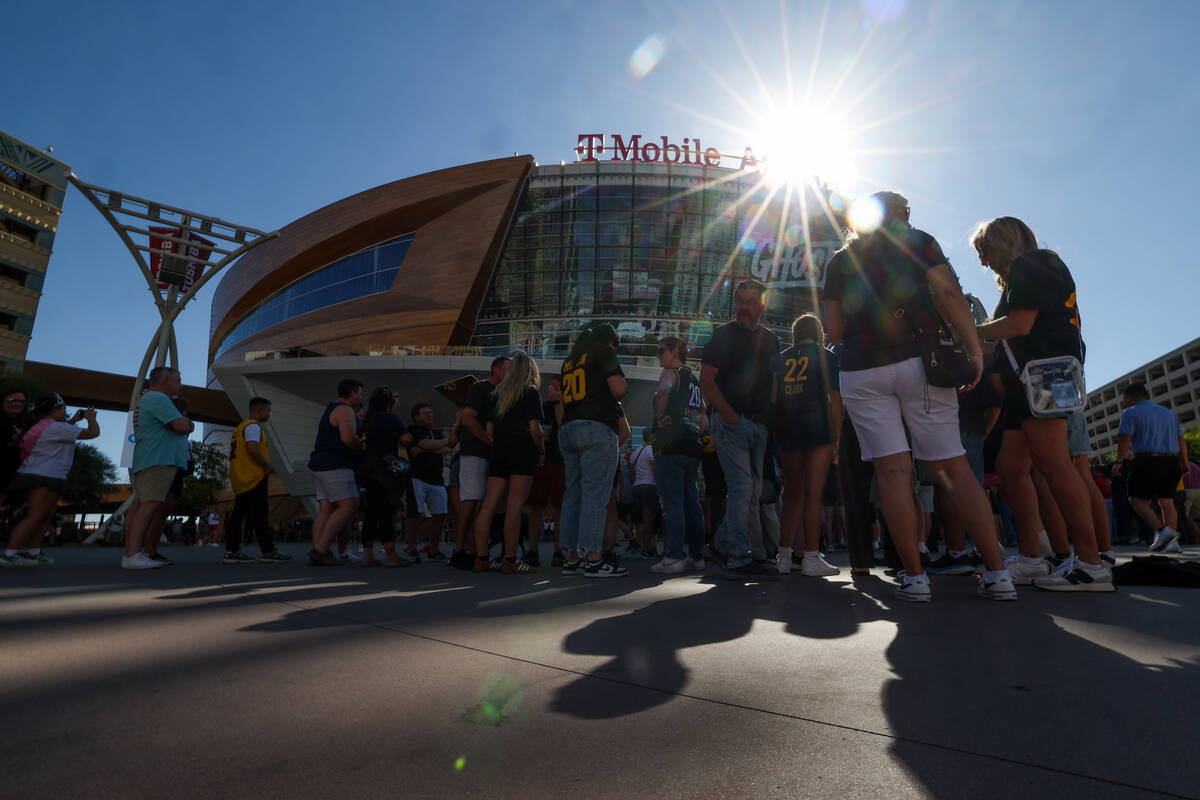 Fans line up before the doors open ahead of a sold-out WNBA basketball game between the Las Veg ...