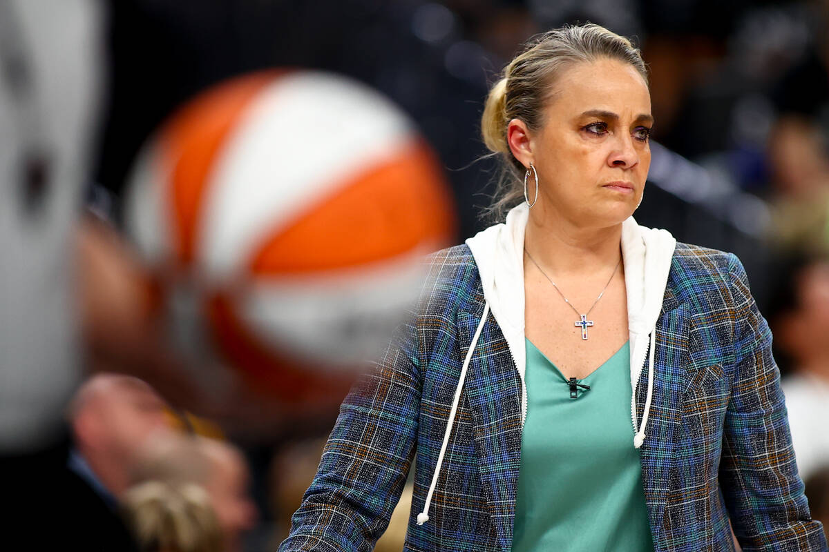 Las Vegas Aces head coach Becky Hammon walks into a time out during the second half of a WNBA b ...