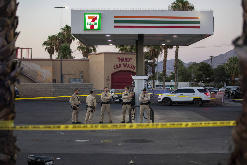 Crews from the Metropolitan Police Department investigate a crash scene at the 7-Eleven on Sout ...