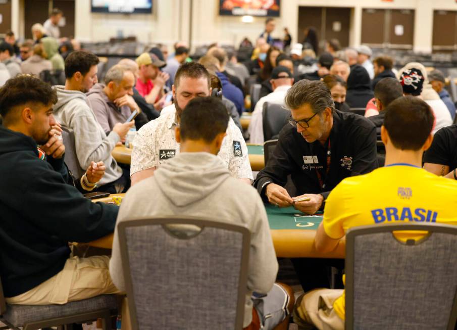 People participate during the first day of the World Series of Poker Main Event at Horseshoe ho ...