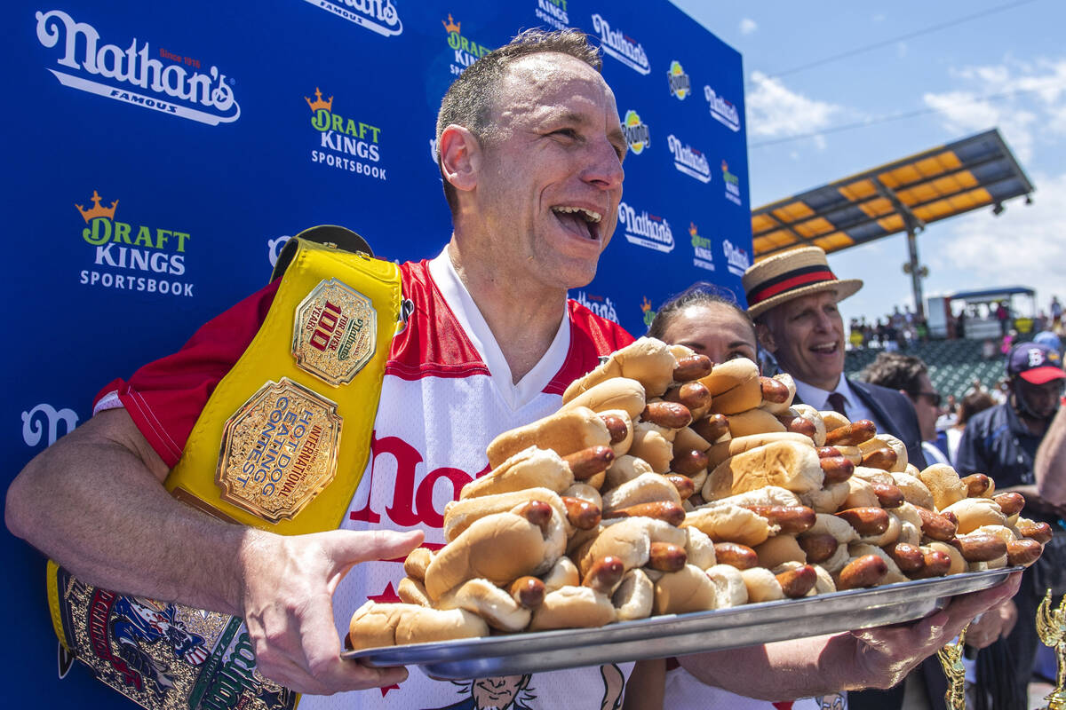 FILE - Joey Chestnut, winner of the 2021 Nathan's Famous Fourth of July International Hot Dog-E ...