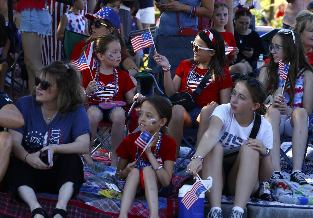 People watch the annual Summerlin Council Patriotic Parade, on Thursday, July 4, 2024, in Las V ...