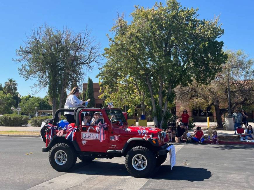 Grand Marshal Lexi Lagan, a pistol shooter from Boulder City who has qualified for the 2024 Oly ...