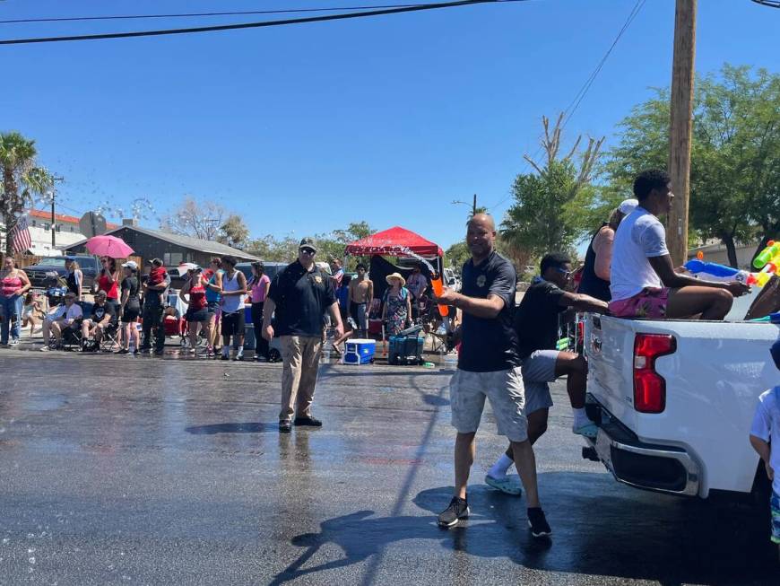 Attorney General Aaron Ford fires his water gun at Boulder City's Damboree celebration on July ...