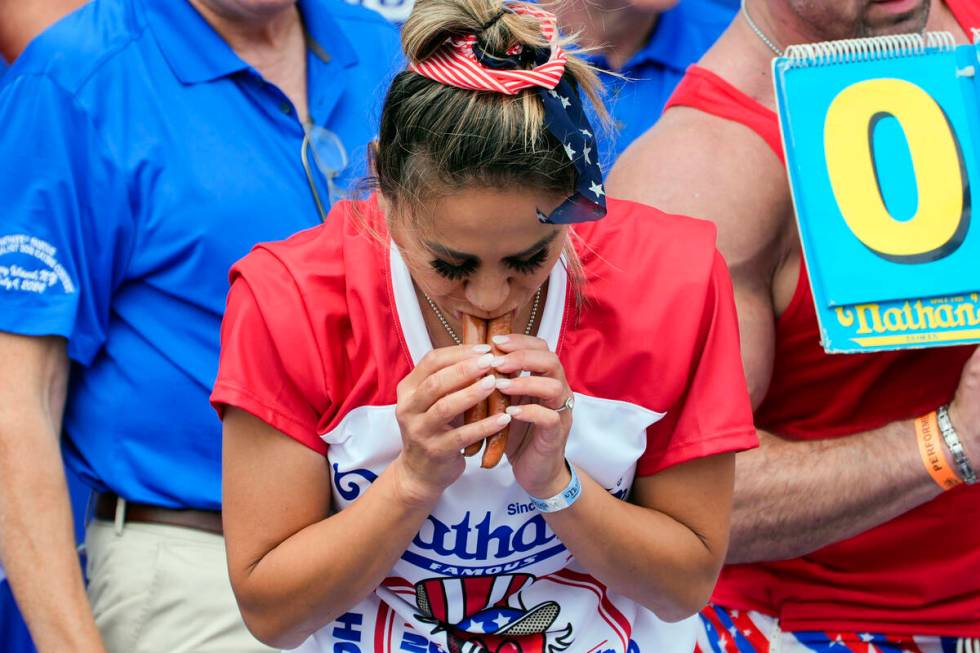 Miki Sudo competes in the Nathan's Famous Fourth of July hot dog eating contest, Thursday, July ...