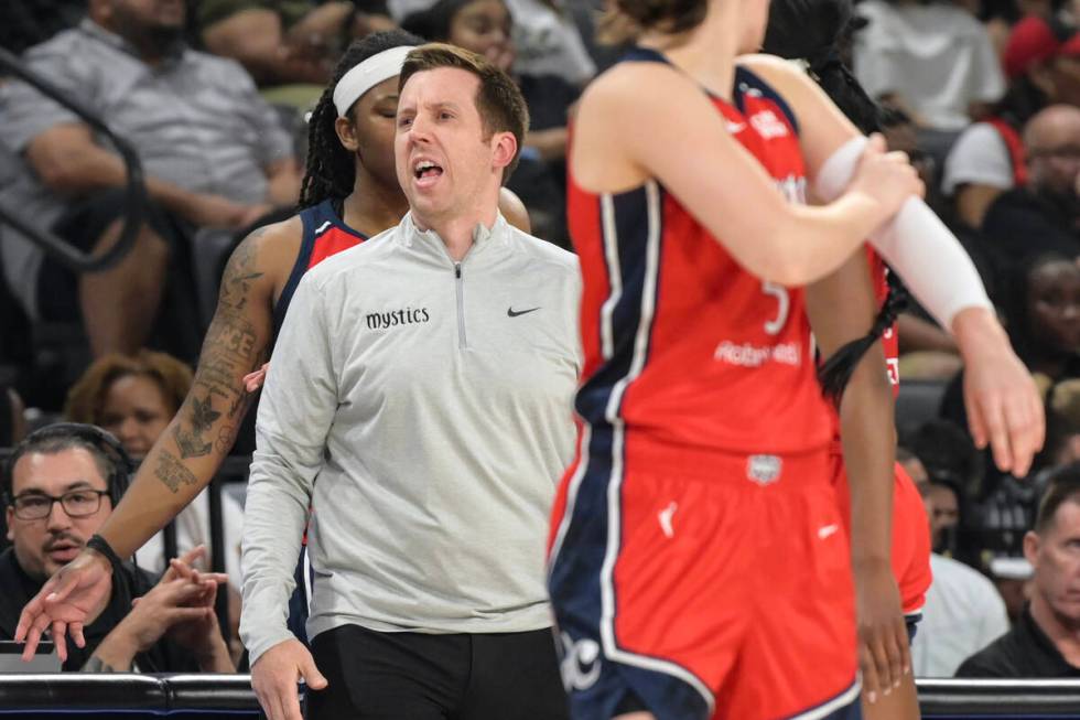 Washington Mystics head coach Eric Thibault directs his team against the Las Vegas Aces during ...