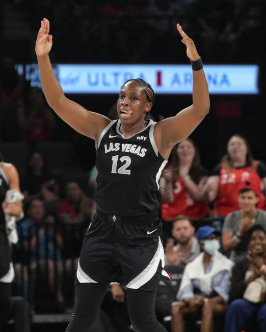 Las Vegas Aces guard Chelsea Gray (12) celebrate a three-point basket against the Washington M ...