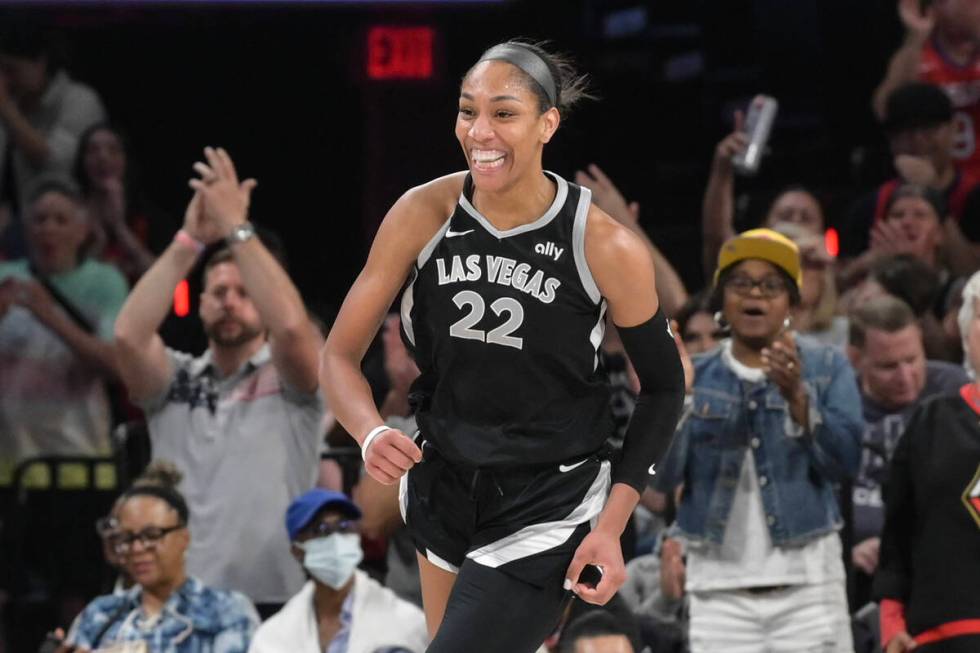 Las Vegas Aces center A'ja Wilson (22) smiles after scorning against the Washington Mystics dur ...