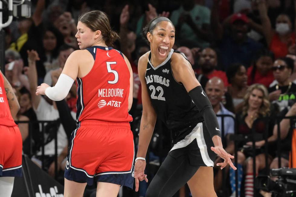 Las Vegas Aces center A'ja Wilson (22) celebrates a play against the Washington Mystics during ...