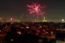 Fireworks explode over a neighborhood on the east side of Las Vegas Thursday, July 4, 2024. (Sa ...