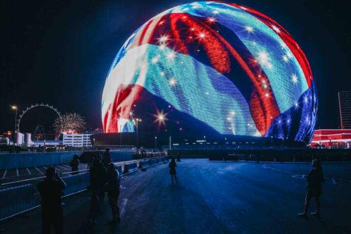 Spectators watch the Sphere on Thursday, July 4, 2024, in Las Vegas. (Madeline Carter/Las Vegas ...