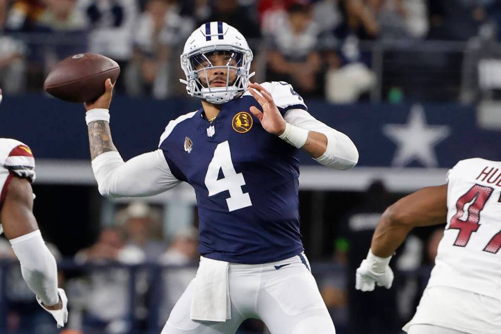 Dallas Cowboys quarterback Dak Prescott (4) passes against the Washington Commanders during the ...