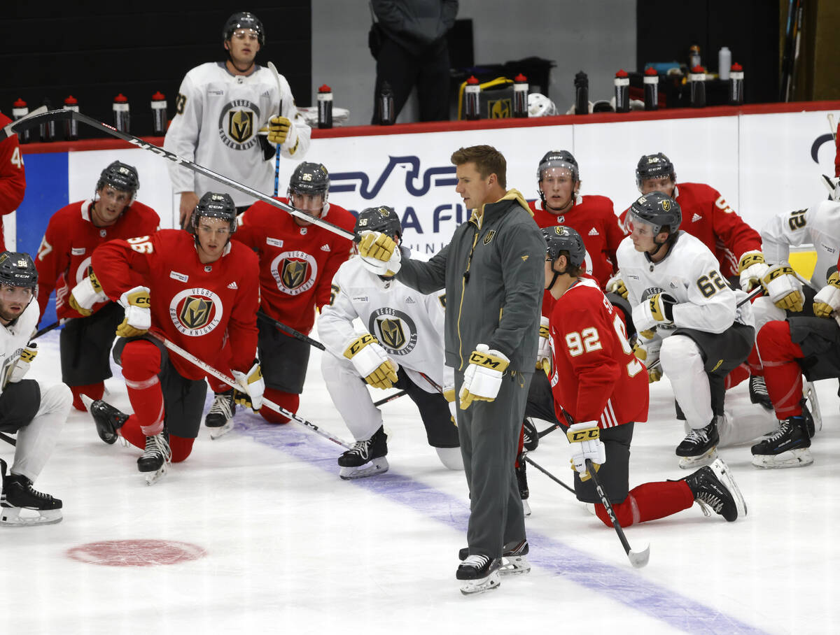 Silver Knights head coach Ryan Craig speaks to players during Golden Knights development camp ...