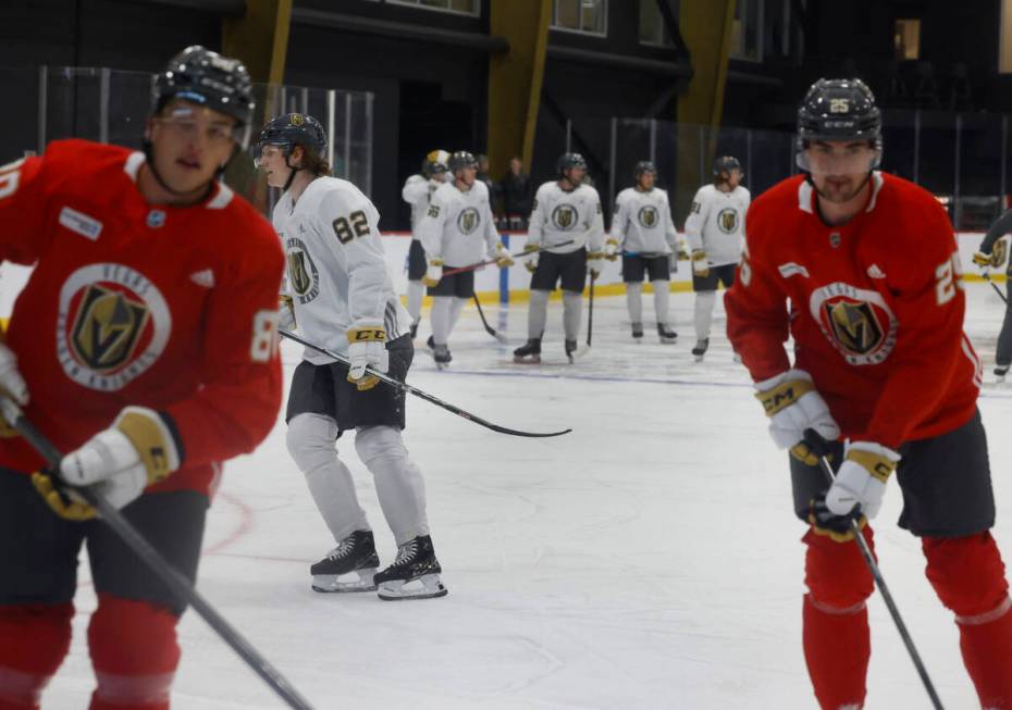 Golden Knights players, including defenseman Abram Wiebe (82), take the ice during team's devel ...