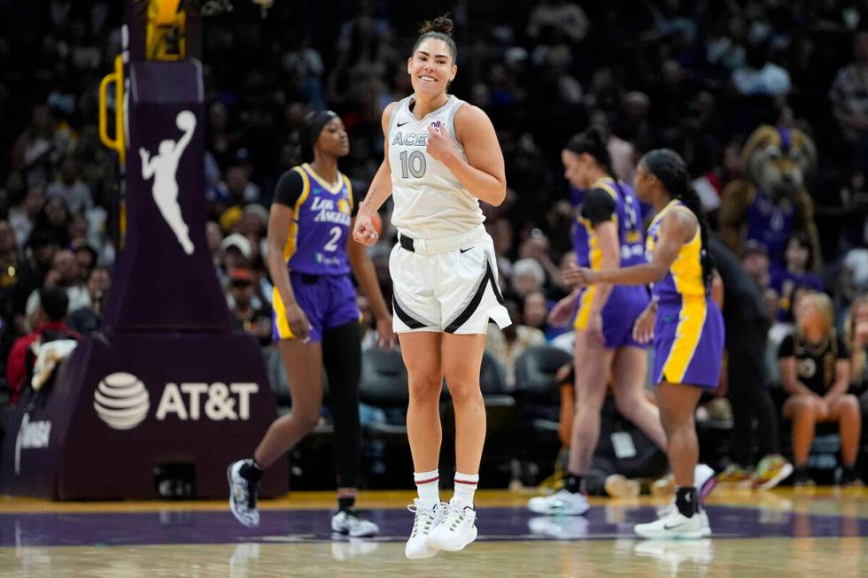 Las Vegas Aces guard Kelsey Plum (10) reacts during the first half of a WNBA basketball game ag ...