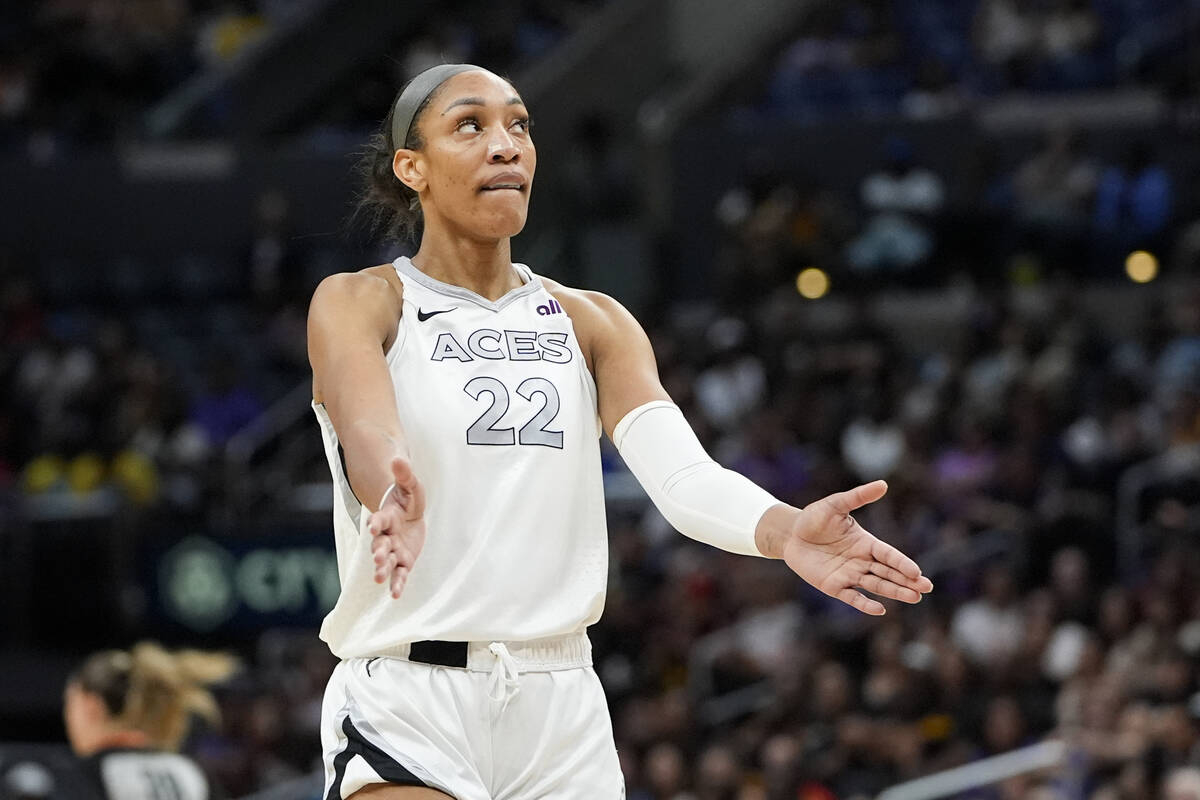 Las Vegas Aces center A'ja Wilson gestures during the first half of a WNBA basketball game agai ...