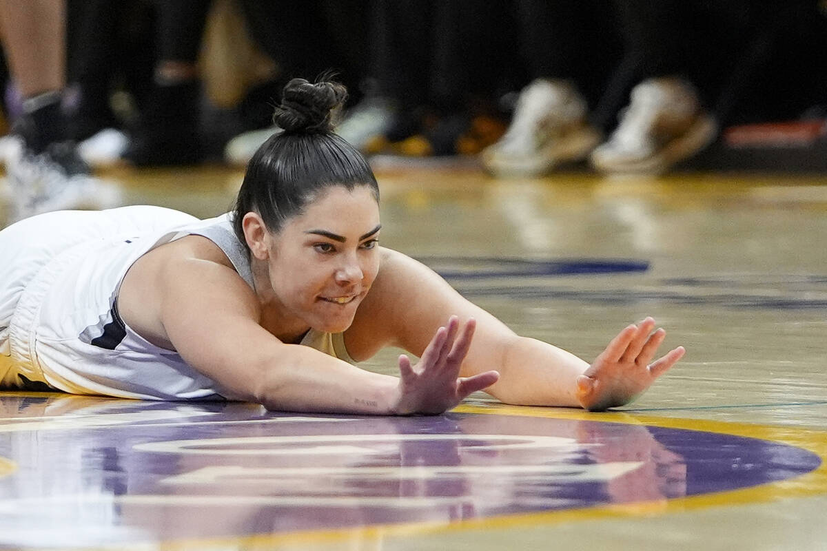 Las Vegas Aces guard Kelsey Plum reacts during the second half of a WNBA basketball game agains ...