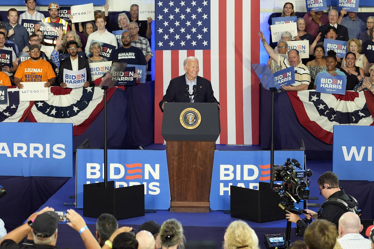 President Joe Biden speaks at a campaign rally at Sherman Middle School in Madison, Wis., Frida ...