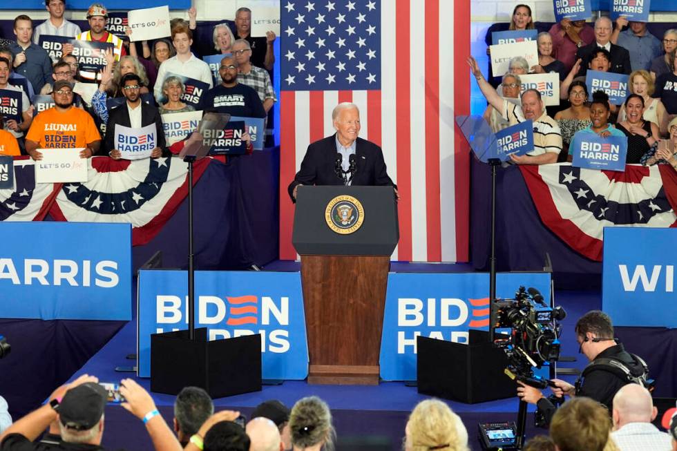 President Joe Biden speaks at a campaign rally at Sherman Middle School in Madison, Wis., Frida ...