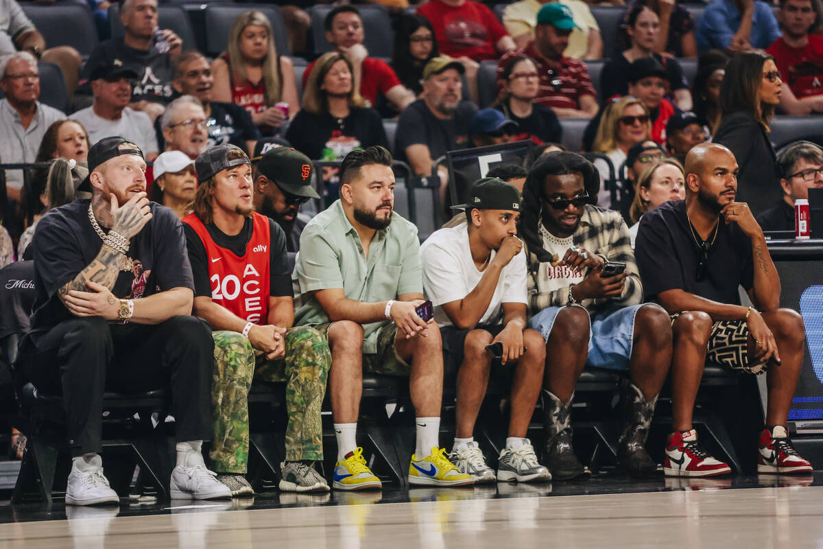 Readers defensive end Max Crosby, left, sits with comedian Theo Von, second from left, and musi ...