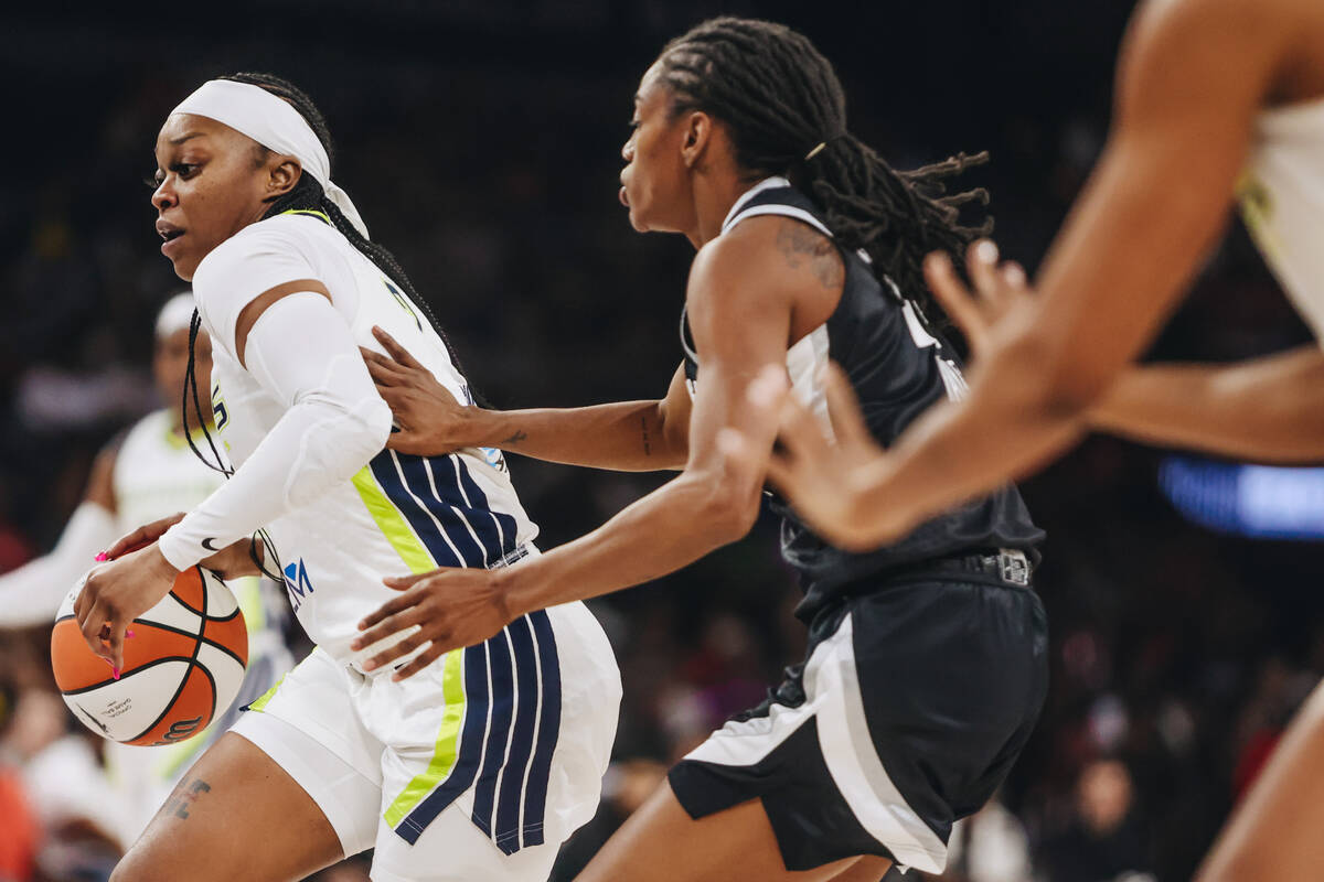 Dallas Wings guard Odyssey Sims (2) drives the ball to the hoop during a WNBA basketball game b ...