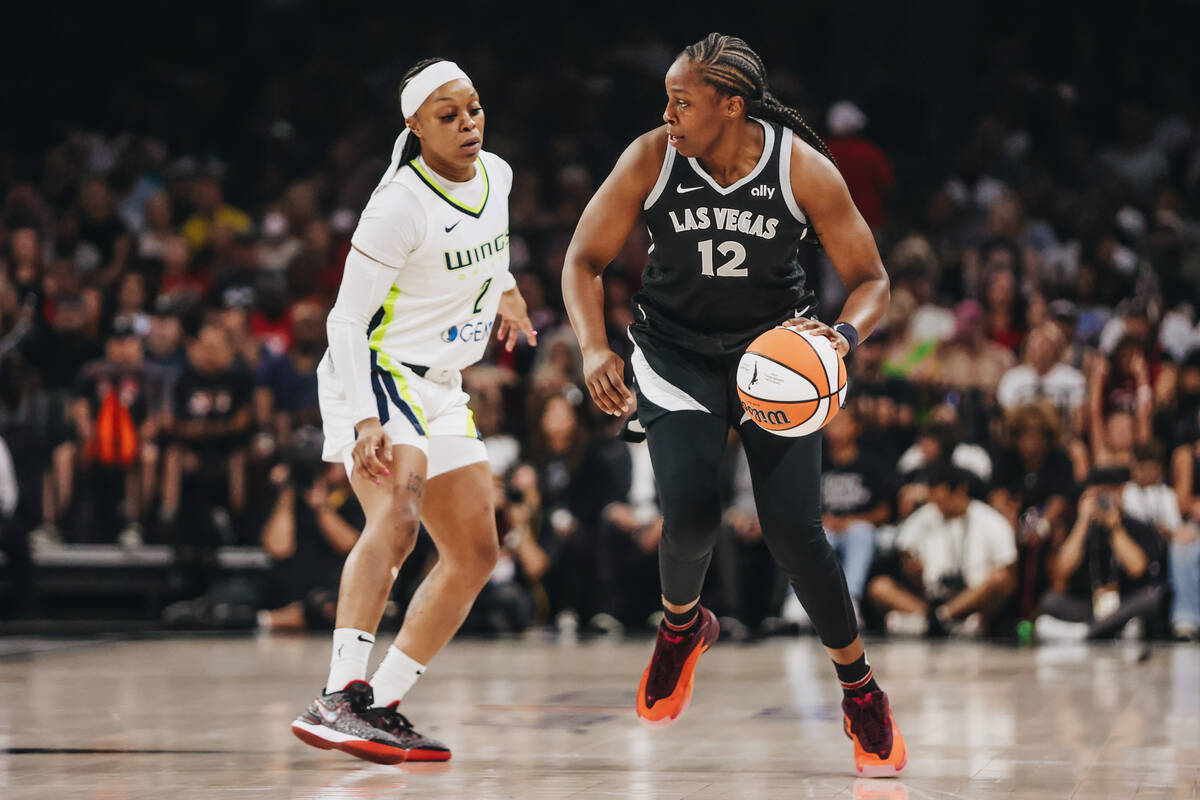 Aces guard Chelsea Gray (12) dribbles the ball dow nthwe court as Dallas Wings guard Odyssey Si ...