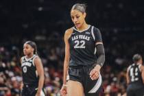 Aces center A'ja Wilson (22) walks on the court during a WNBA basketball game between the Aces ...