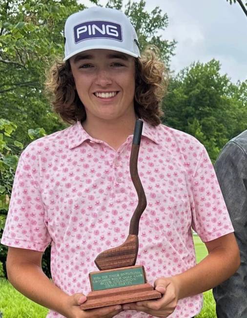 Drake Harvey holds his trophy after winning the Pete & Alice Dye Junior Invitational at Crooked ...