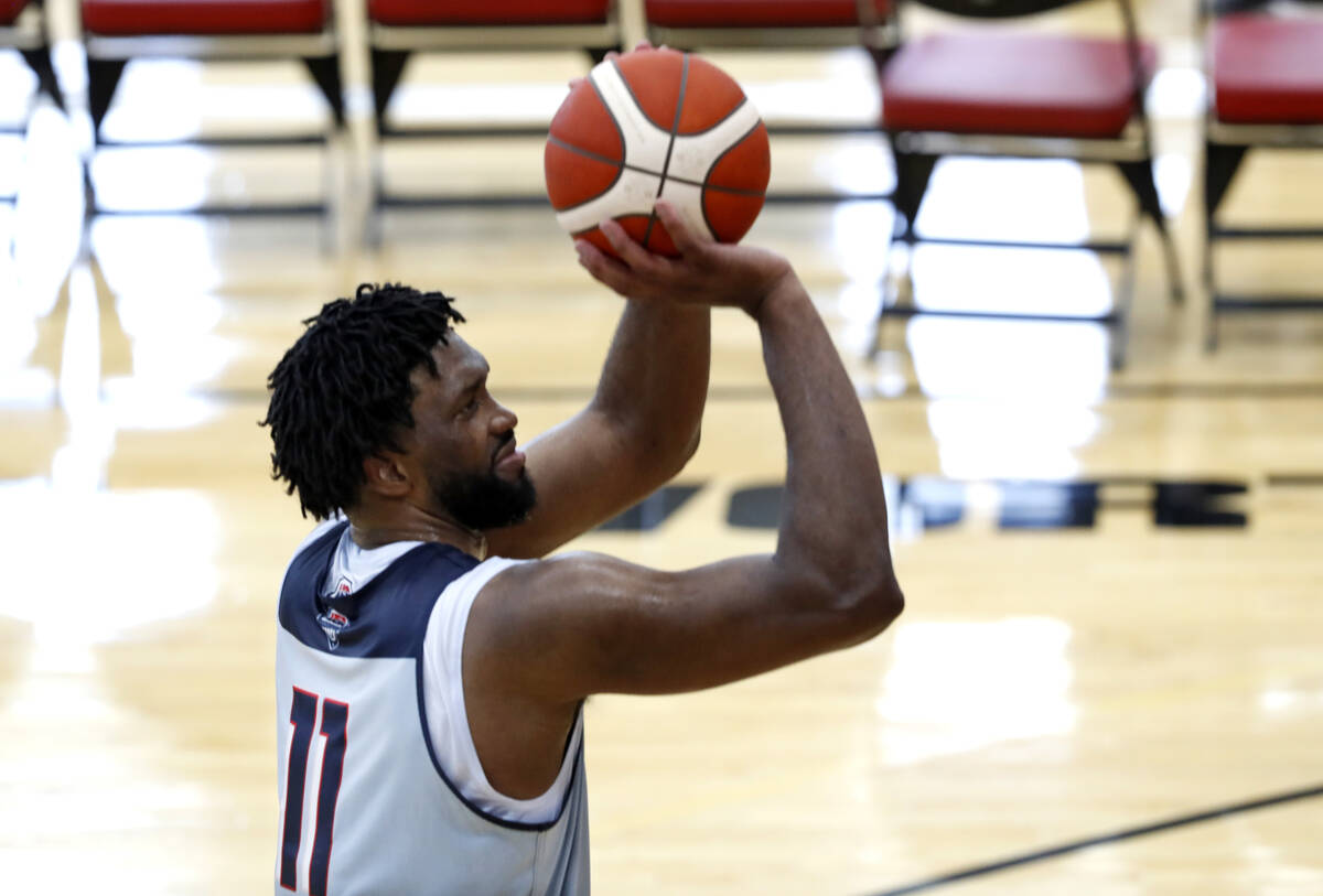 Joel Embiid, of the Philadelphia 76ers, shoots baskets during training camp for the United Stat ...