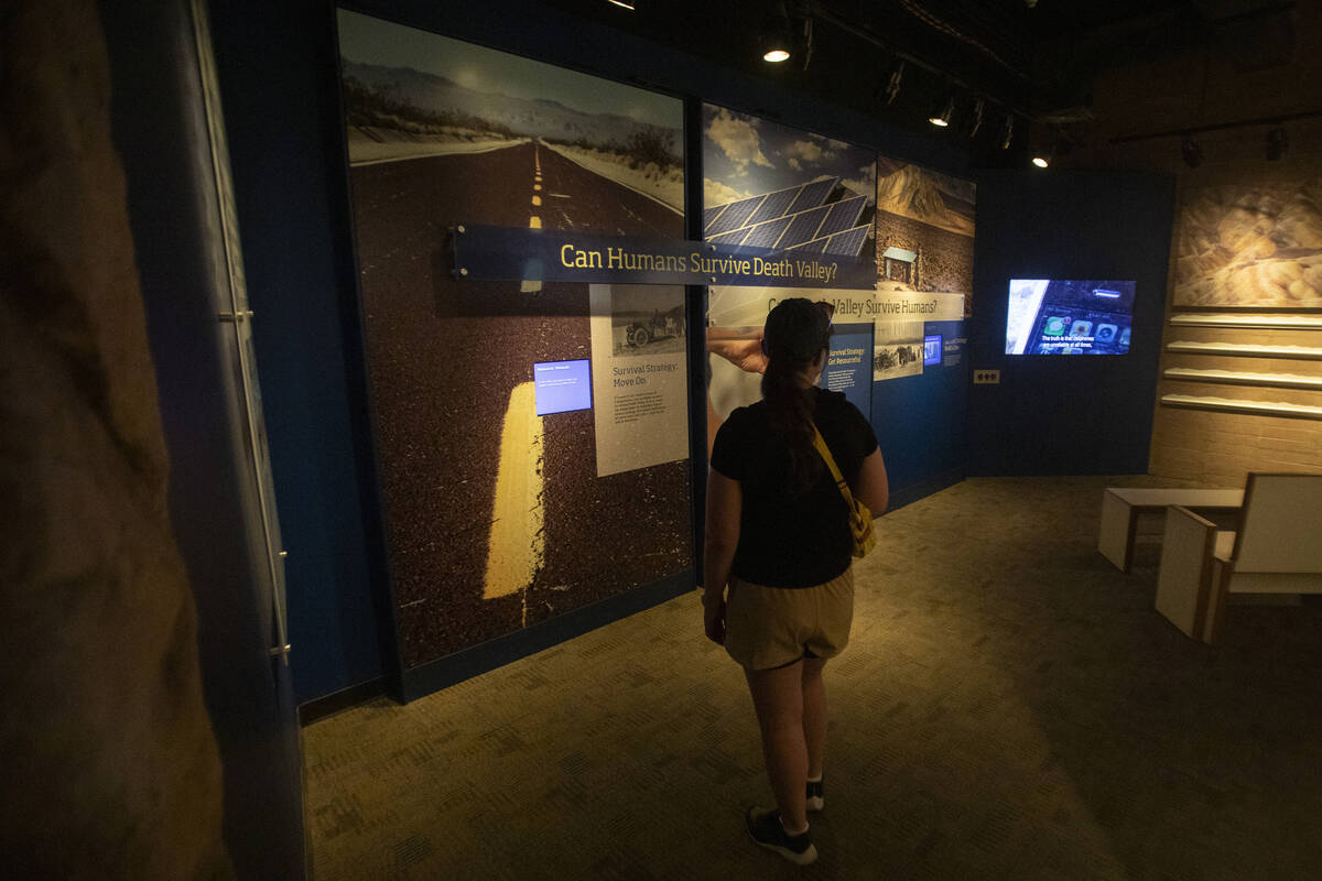 Tourists visit the museum inside the Furnace Creek Visitor Center on Monday, July 8, 2024, in D ...