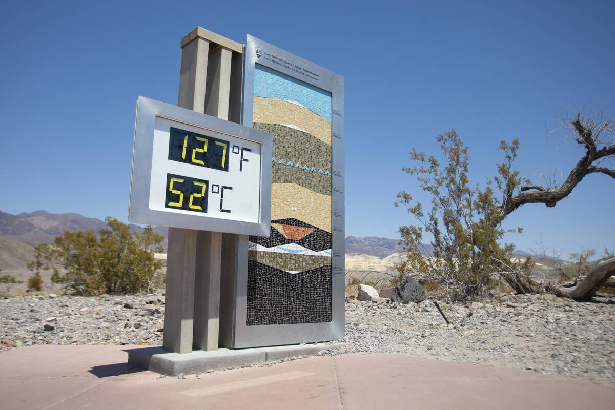 The thermometer in front of the Furnace Creek Visitor Center on Monday, July 8, 2024, in Death ...