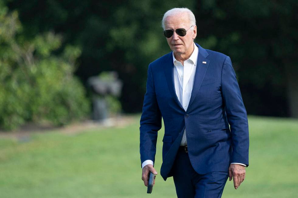 U.S. President Joe Biden walks to the White House in Washington, D.C., on July 7, 2024, after a ...