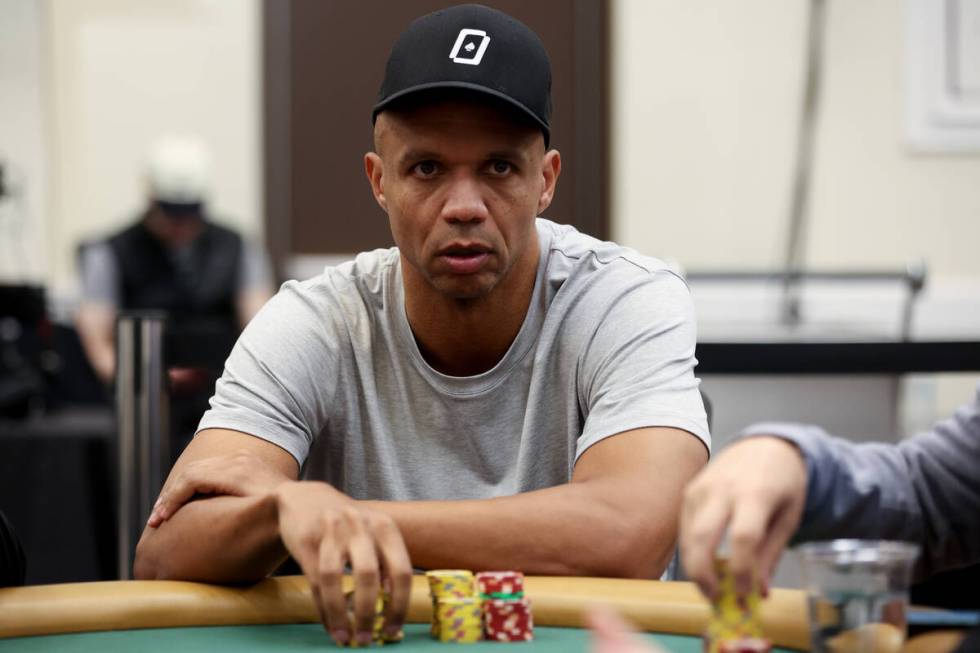 Phil Ivey eyes his opponents during the World Series of Poker main event at Horseshoe Las Vegas ...