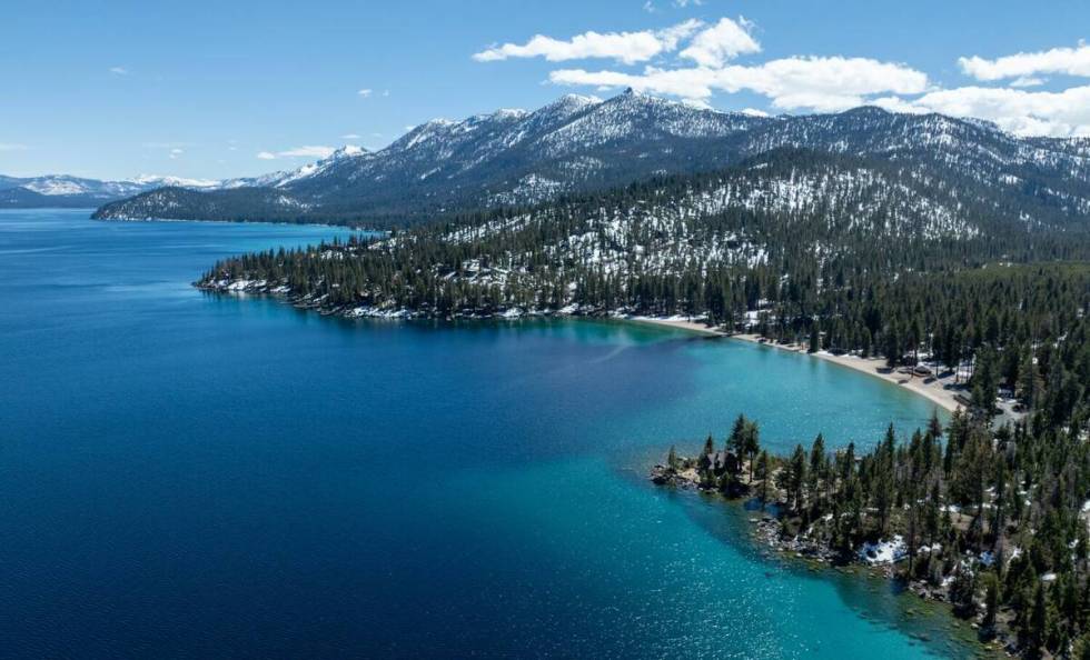 On Monday, caution signs at El Dorado Beach in South Lake Tahoe warned visitors that the harmfu ...