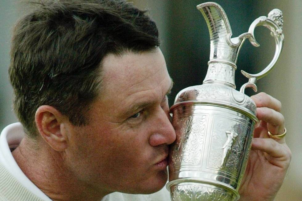 Todd Hamilton of the United States kisses the trophy after winning the British Open golf champi ...