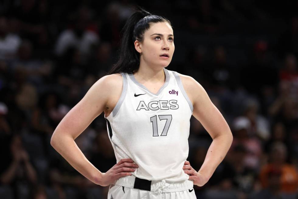 Las Vegas Aces center Megan Gustafson (17) watches a free throw during the first half of a WNBA ...