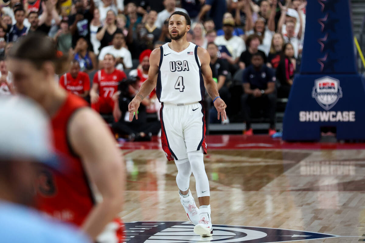 USA guard Stephen Curry (4) celebrates after scoring a three-point basket during the first half ...