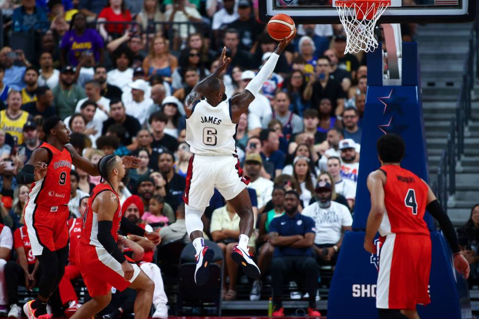 USA forward LeBron James (6) shoots against Canada during the second half of a showcase basketb ...
