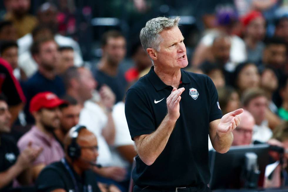 USA head coach Steve Kerr claps on the sideline during the second half of a showcase basketball ...