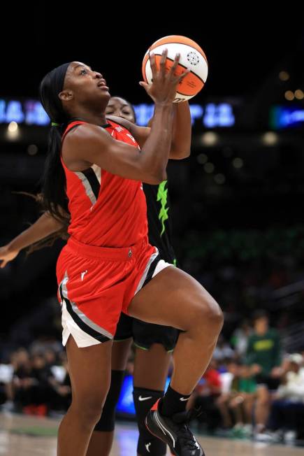Aces guard Jackie Young drives to the basket against the Seattle Storm on Wednesday, July 10, 2 ...