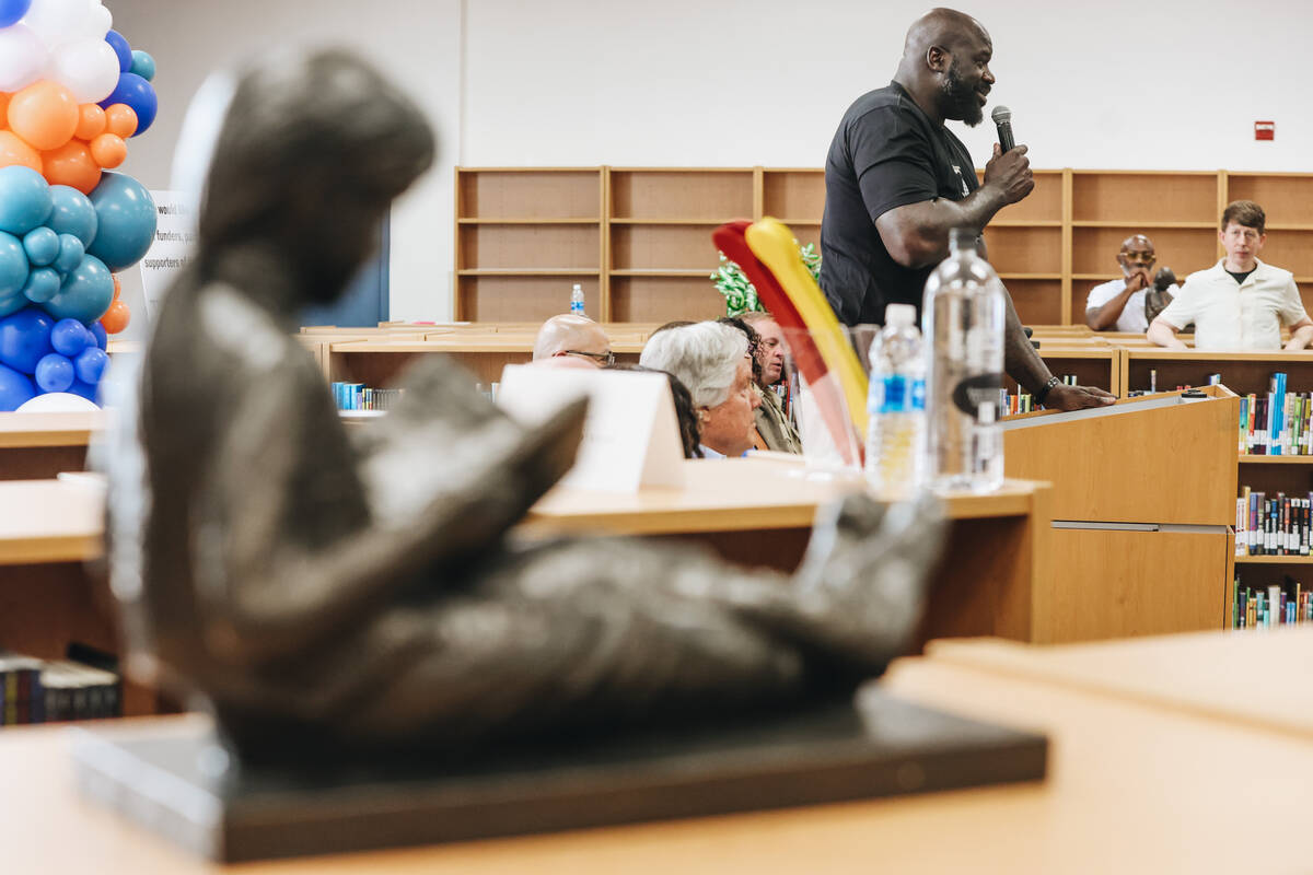 Shaquille O’Neal speaks to a crowd during a press conference at the Shaq-to-School event ...