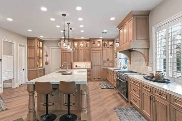 The Hellmuth Borges Team The fully remodeled kitchen showcases custom quarter-sawn oak cabinet ...