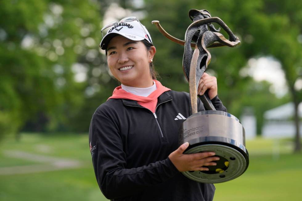Rose Zhang poses for photos after winning the LPGA Cognizant Founders Cup golf tournament, Sund ...