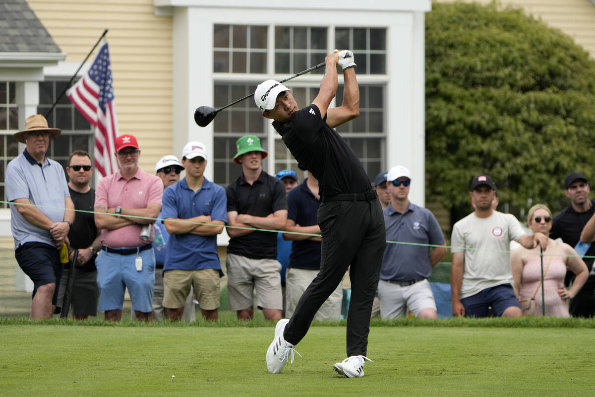 Collin Morikawa tees off on the sixth hole during the final round of the Travelers Championship ...